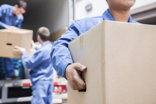 Office relocation planning in Knightsbridge with business equipment and moving boxes