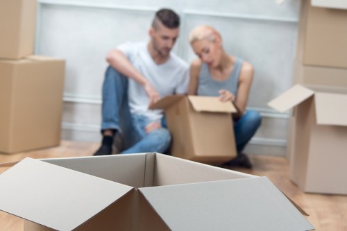 Skilled movers handling high-value furniture in Knightsbridge apartment building
