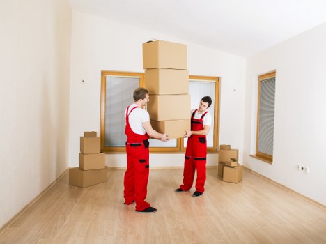 Mover handling goods carefully during a removals service