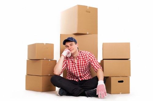 Professional movers handling furniture in Knightsbridge